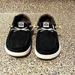 Hey dude women’s shoes size 7. Only worn one time.